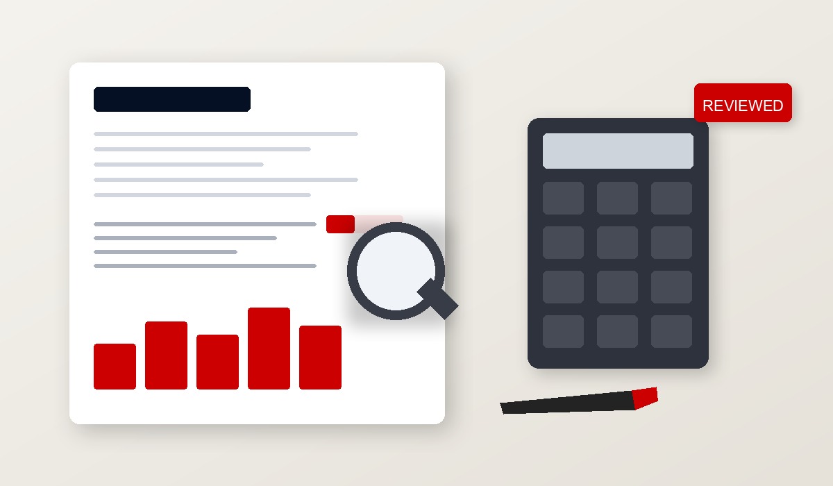 Financial documents and calculator representing audit and attestation services